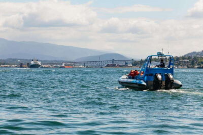 Vancouver: Indian Arm and Granite Falls Zodiac Boat Tour - Passing under the Lion’s Gate: North Shore mountains and shipping reality