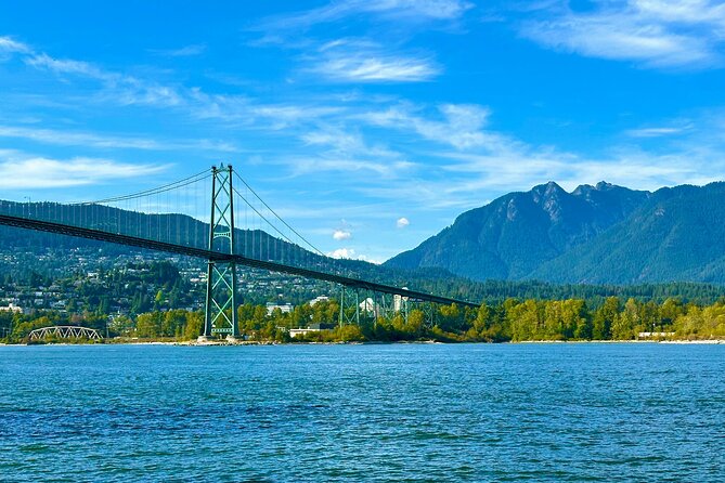 Vancouver Sightseeing Boat Cruise with Live Tour Guide - Burrard Street bridge and the move toward the beaches