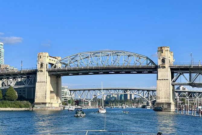 Vancouver Sightseeing Boat Cruise with Live Tour Guide - Stanley Park edge: the park from the shoreline side